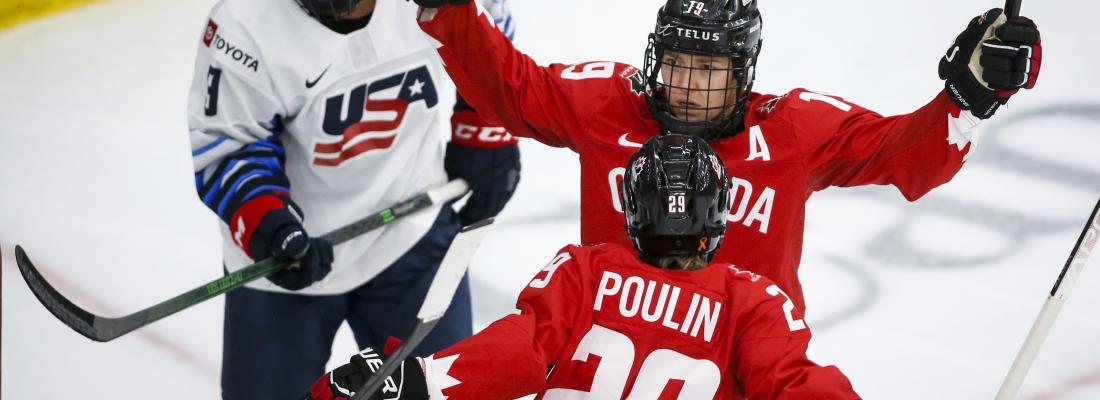 Canada's Brianne Jenner, right, celebrates her goal with teammate Marie-Philip Poulin, centre, during the second period of the gold medal final IIHF Women's World Championship hockey action in Calgary on Aug. 31, 2021.(THE CANADIAN PRESS/Jeff McIntosh) Canada's Brianne Jenner, right, celebrates her goal with teammate Marie-Philip Poulin, centre, during the second period of the gold medal final IIHF Women's World Championship hockey action in Calgary on Aug. 31, 2021.(THE CANADIAN PRESS/Jeff McIntosh)