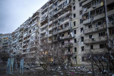 View of a building damaged following a rocket attack the city of Kyiv, Ukraine, Friday, Feb. 25, 2022. (AP Photo/Emilio Morenatti) 