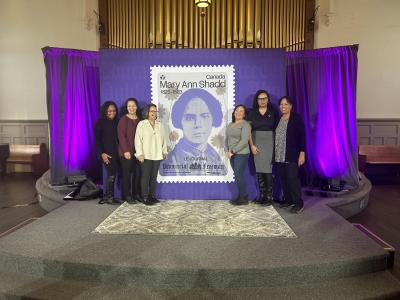 A new postage stamp honouring Mary Ann Shadd Cary is unveiled, as her relatives celebrate the achievement. (Photo via Buxton Museum’s Facebook page.)