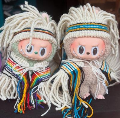 Labubus wearing regalia created by Tlingit artist Lily Hope. (Photo via Lily Hope Weaver’s Instagram feed.)