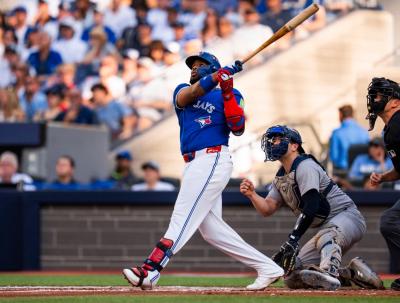 Vladimir Guerrero Jr. hits a home run in Game 1 against the New York Yankees. (Photo via Toronto Blue Jays’ Facebook page.)