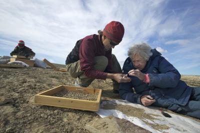 Dr. Natalia Rybczynski (left) and Dr. Mary Dawson search for fossils at Haughton Crater. (Photo used with permission from the Canadian Museum of Nature.)
