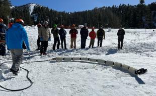 Scientists test the EELS robot on snowy surfaces on Earth. (Photo credit: NASA/JPL-Caltech.)