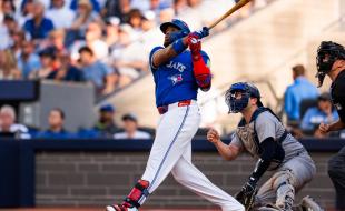 Vladimir Guerrero Jr. hits a home run in Game 1 against the New York Yankees. (Photo via Toronto Blue Jays’ Facebook page.)