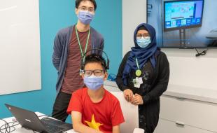 Researchers at Holland Bloorview Kids Rehabilitation hospital work with a patient using Brain Computer Interface technology. (Photo via Holland Bloorview Kids Rehabilitation Hospital’s Facebook page.)